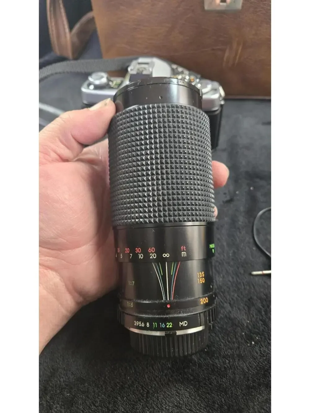 Minolta SLR 35mm Film Camera with Lens, Flash, and Carrying Case
